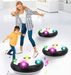 Kid and parent playing with LED Hover Soccer Balls in a bright indoor setting, showcasing fun and active playtime.