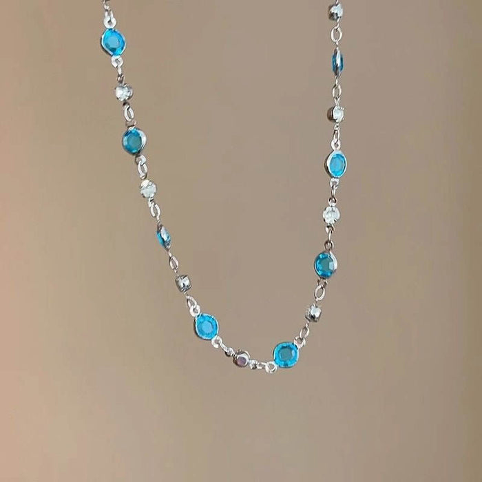 LATS Romantic Blue Crystal Butterfly Necklace featuring shiny blue crystals and silver accents, perfect for women's fine jewelry.